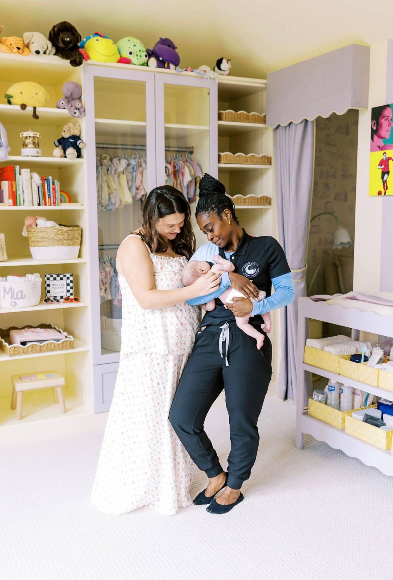Kim Morgan Smart supporting a family with their newborn